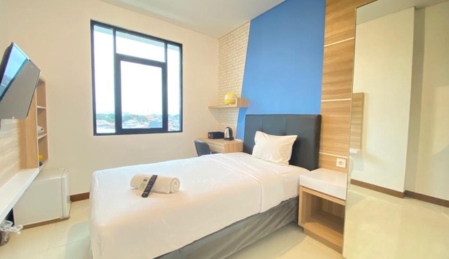 Comfortable Studio Semi Apartment at The Lodge Paskal near BINUS University By Travelio