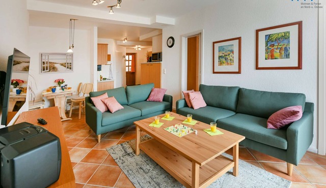 Comfortable vacation apartment with lake view and conservatory in the Seedorf vacation park