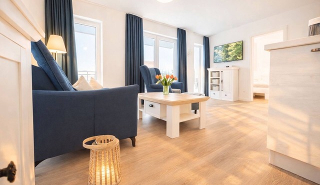 Comfortable vacation home on the beach with balcony, sauna and modern facilities