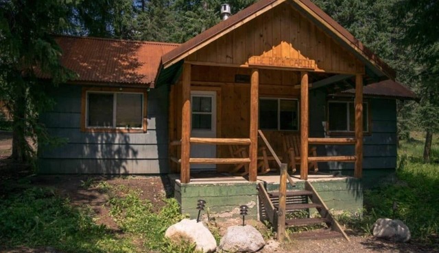 Comfy cabin is situated on the Silver Gate property which overlooks 10,000ft tall mountain peaks surrounding the town.