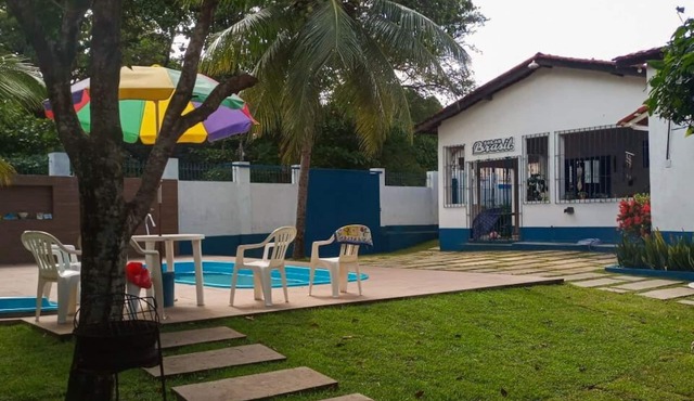 Complete house with pool near the center.
