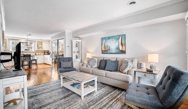 Condo across from beautiful beach with Pool! Two Floors!