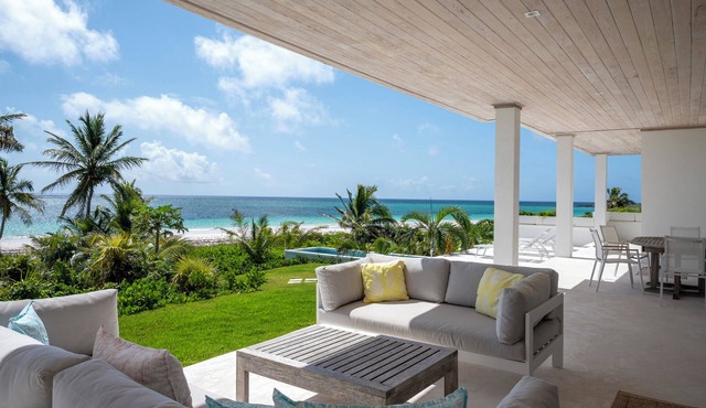 Contemporary Beachfront Escape with Private Pool on Windermere's World-Famous Pink Sand Beach