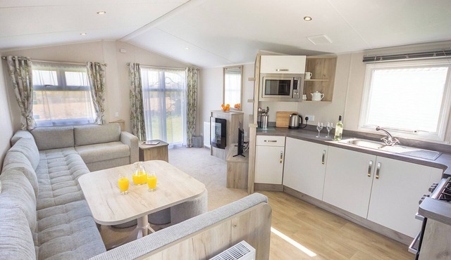 Contemporary caravan with one double and one twin.