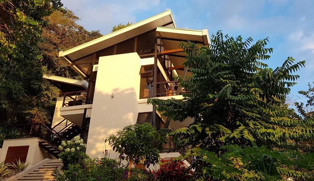 Contemporary hillside home overlooking the Pacific Ocean.
