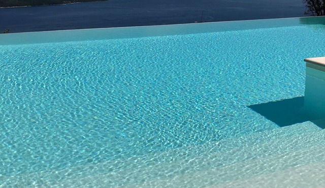 Contemporary villa, prime location , stunning views and heated infinity pool