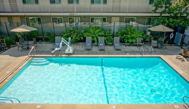 Convenient Suite | Near Trails & Dining | Outdoor Pool | Parking | BBQ Area