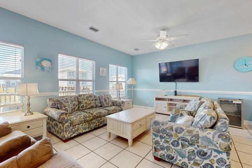 Corner Gulf beachfront condo with pool hot tub sauna & private balcony