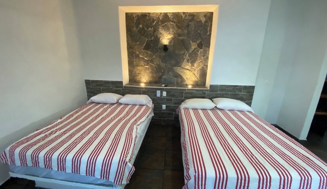 Costa Ayala suite 8 with 2 dbl bed and 1 sofa, all basics, 2 blocks from beach