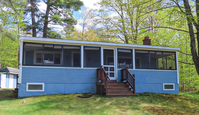 Cottage with beach access, a fireplace, yard, grill, cable & golf nearby