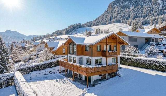 Country house by the slopes with mountain views
