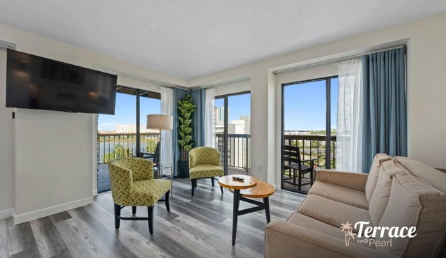 Couples Getaway with Private Terrace and Epic Universe View