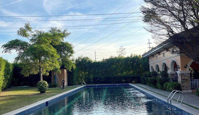 Cozy 2-bedroom house in welcoming Tarlac with pool access