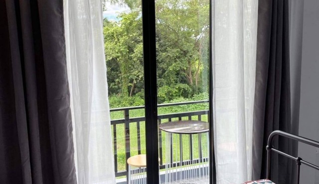 Cozy 2-bedroom townhome in charming San Phi Suea with WiFi, AC