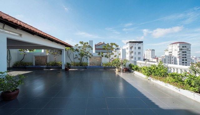 Cozy 2BR Condo with Hardwood Floors & Rooftop Sunset View in Charming Phnom Penh