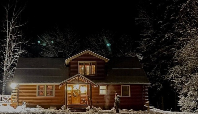 Cozy Adirondack Log Cabin On Trout Stream In A 1 1/2 acre pine plantation.