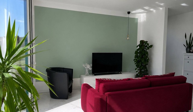 Cozy apartment with terrace surrounded by greenery