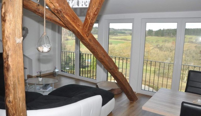 Cozy apartment with a fantastic view over the valley and horse meadows