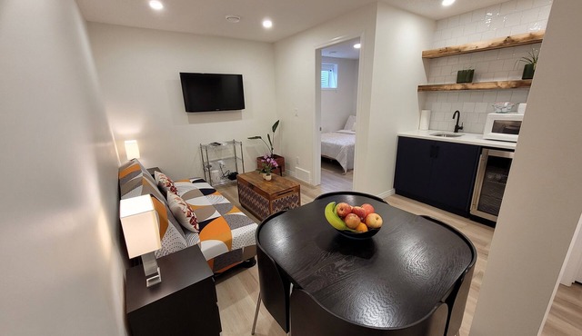 Cozy basement unit near restaurants, bars, stores, bus stations, and hospital.