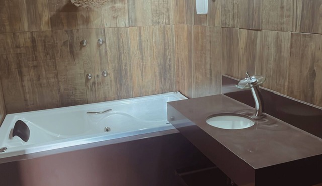 Cozy, spacious, with a hot tub and air conditioning