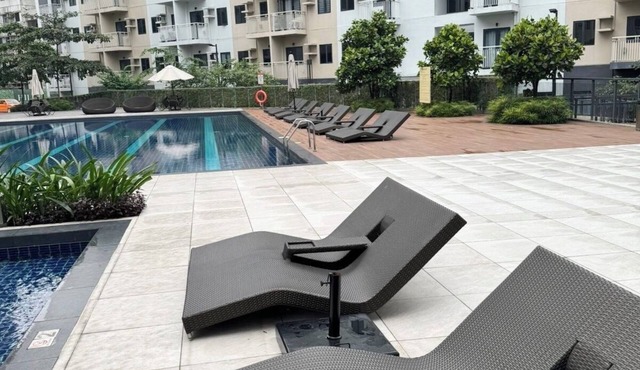 Cozy, Spacious 1-bedroom Condo in Novaliches, Perfect for Staycations & Creators