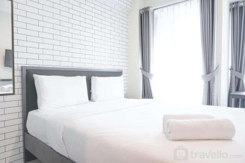 Cozy Studio at Tifolia Apartment By Travelio