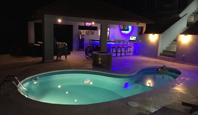 Cozy studio with private Pool and Bar modern amentities perfect for relaxation.