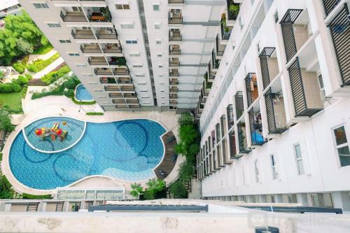 Cozy Style and Good Deal Studio Signature Park Grande Apartment By Travelio