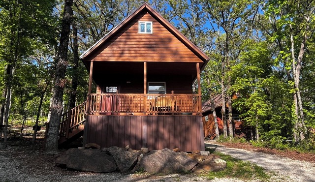 Cozy tiny cabin nestled in a little woodland village – playground, pond and more