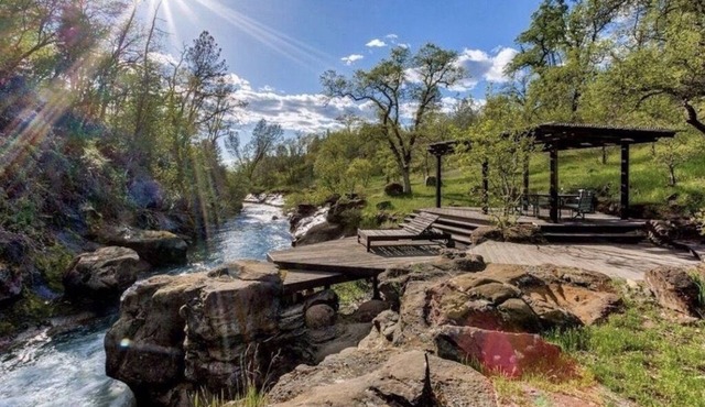 Creekside home and private waterfall on acred estate, near Lassen & Burney.