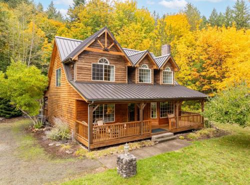 Custom Crafted Forest Retreat with Pond on 5 Acres