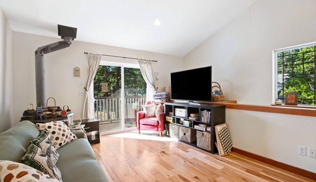Custom home with balcony, radiant floor heating & washer/dryer