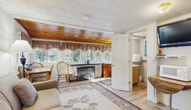Cute Riverfront Cabin in Great Location w/Shared Pool, Kitchenette, & Free WiFi