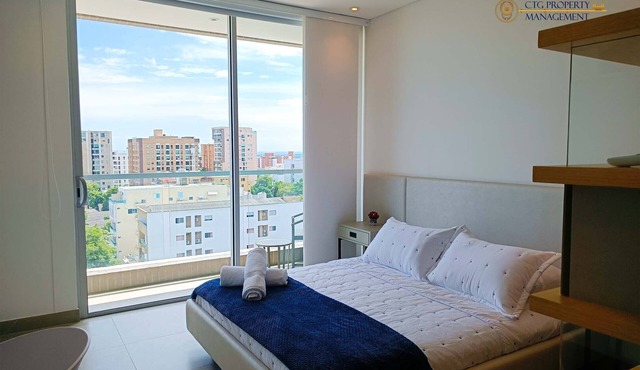 D90-904 Hermoso Loft amoblado con estacionamiento