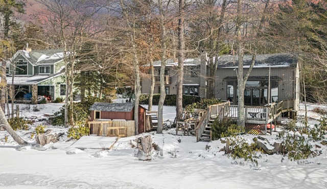 Deck w/Lake Views, Fireplace, Shuffleboard, and Office | Lakeside Retreat