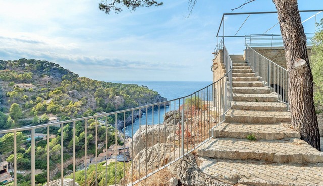 Deia tower overlooking the sea and it famous cove.