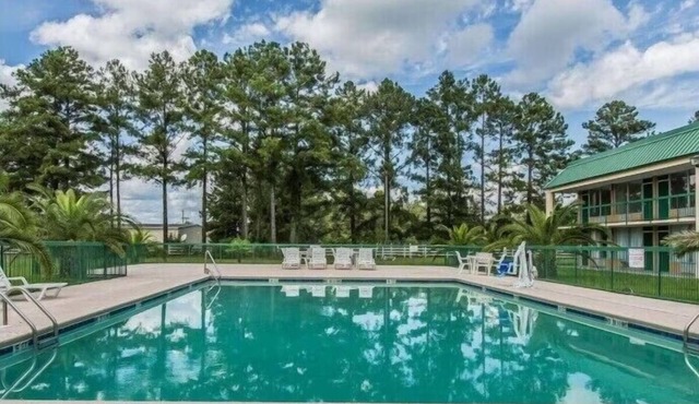 Delight in Pet-Friendly Four Double Queen Bed Rooms w/Pool Outdoor Pool