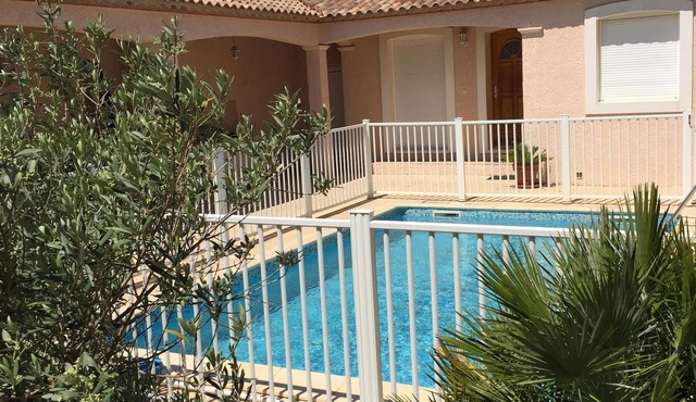 Delightful spacious modern villa a short stroll from the beach and resort centre