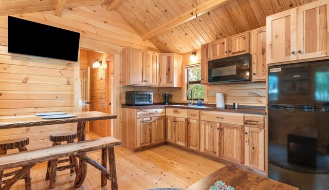 Deluxe Family Cabin with Porch View - Happy Travelers RV Resort