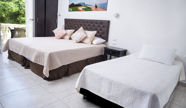 Deluxe Triple con Balcon