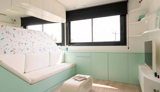 Design flat for 2 people with communal swimming pool and gym.