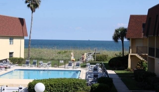 Direct Beach Access, ground floor corner unit, freshly updated in cozy setting.