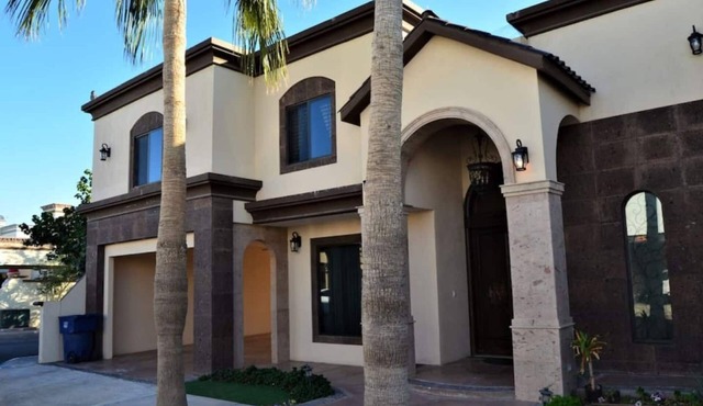 Dive into the relaxed elegance of our 4-bedroom haven in Zona Dorada, Mexicali's prestigious district, combining comfort, security, and luxury. Ideally nested near bustling plazas, trendy restaurants, and lively casinos, our property is perfect