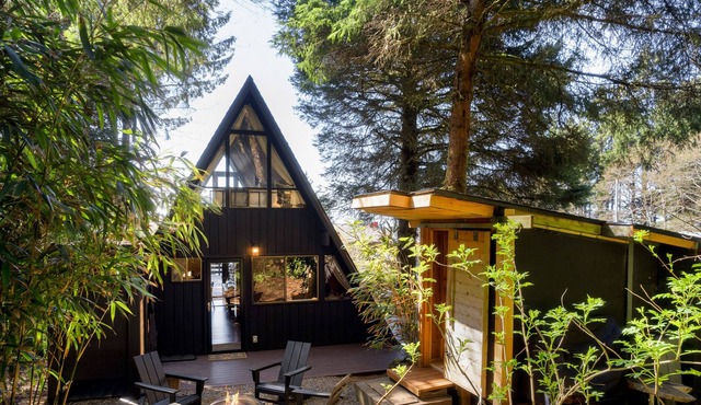 Dog-friendly A-frame with hot tub, fireplace, grill, & firepit - walk to beach