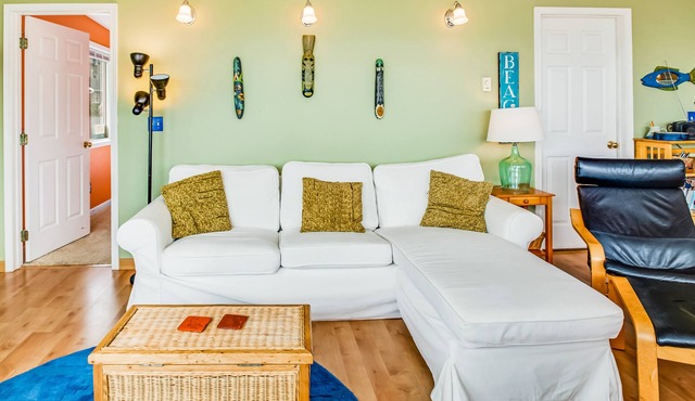 Dog-friendly home with ocean views and fireplace, walk to beach