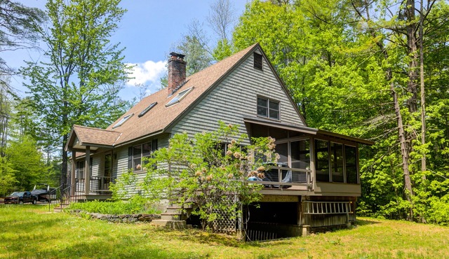 Dog-friendly home with firepit, screened porch, deck & association beach
