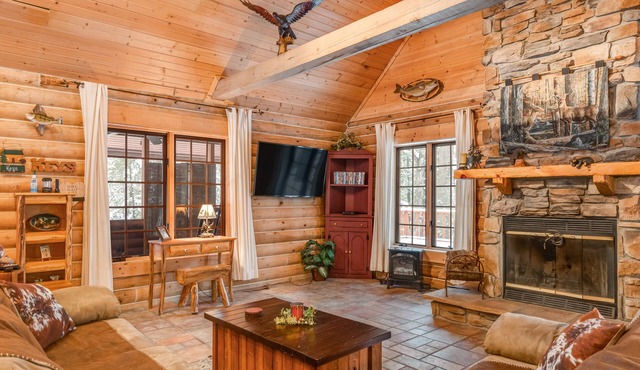 Dog-friendly log cabin on the river with deck & firepit - near Wisconsin Dells