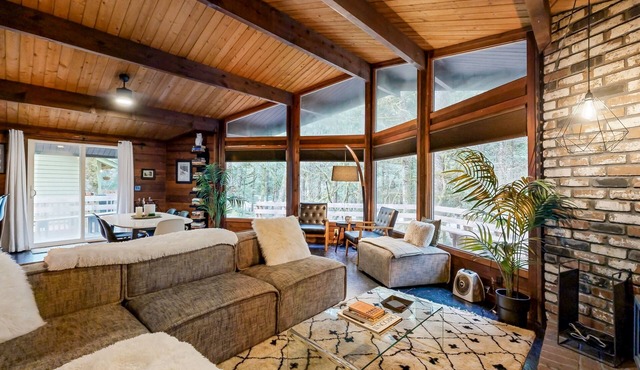 Dog-friendly, mid-century forest cabin with hot tub, firepit & great location