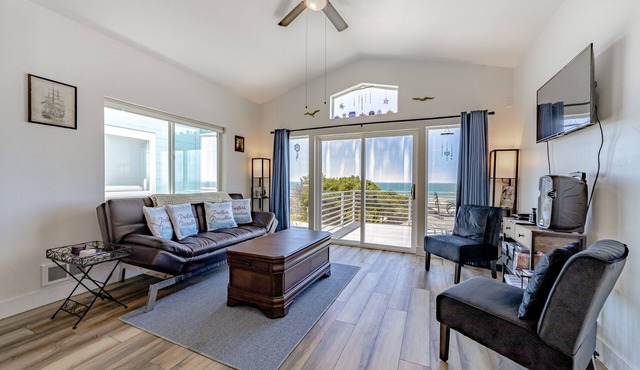 Dog-friendly oceanside home w/WiFi, ocean views, private W/D, deck, & fireplace