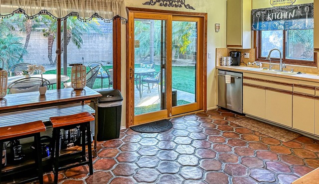 Dog-friendly retreat with enclosed yard, grill, fireplace, & AC - great location